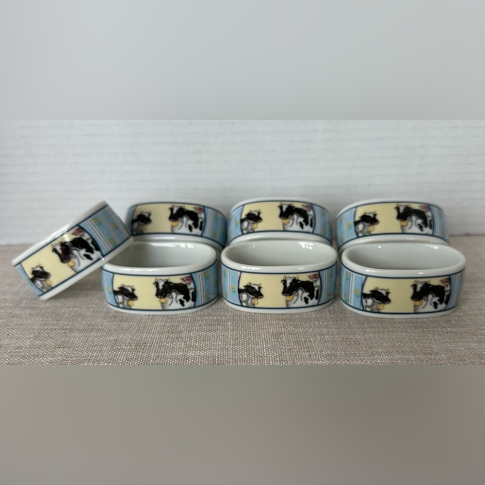 Vintage Porcelain Country Cows Napkin Rings.